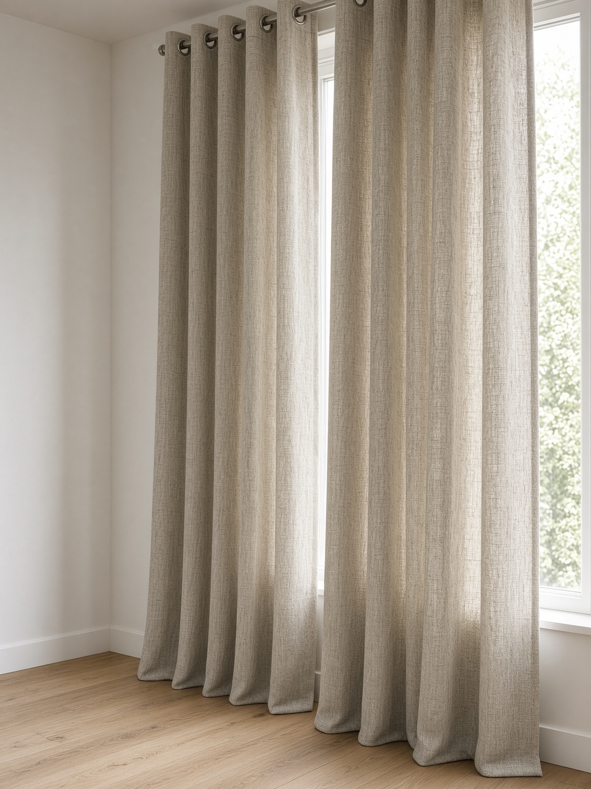 Natural textured curtains at a tall window.