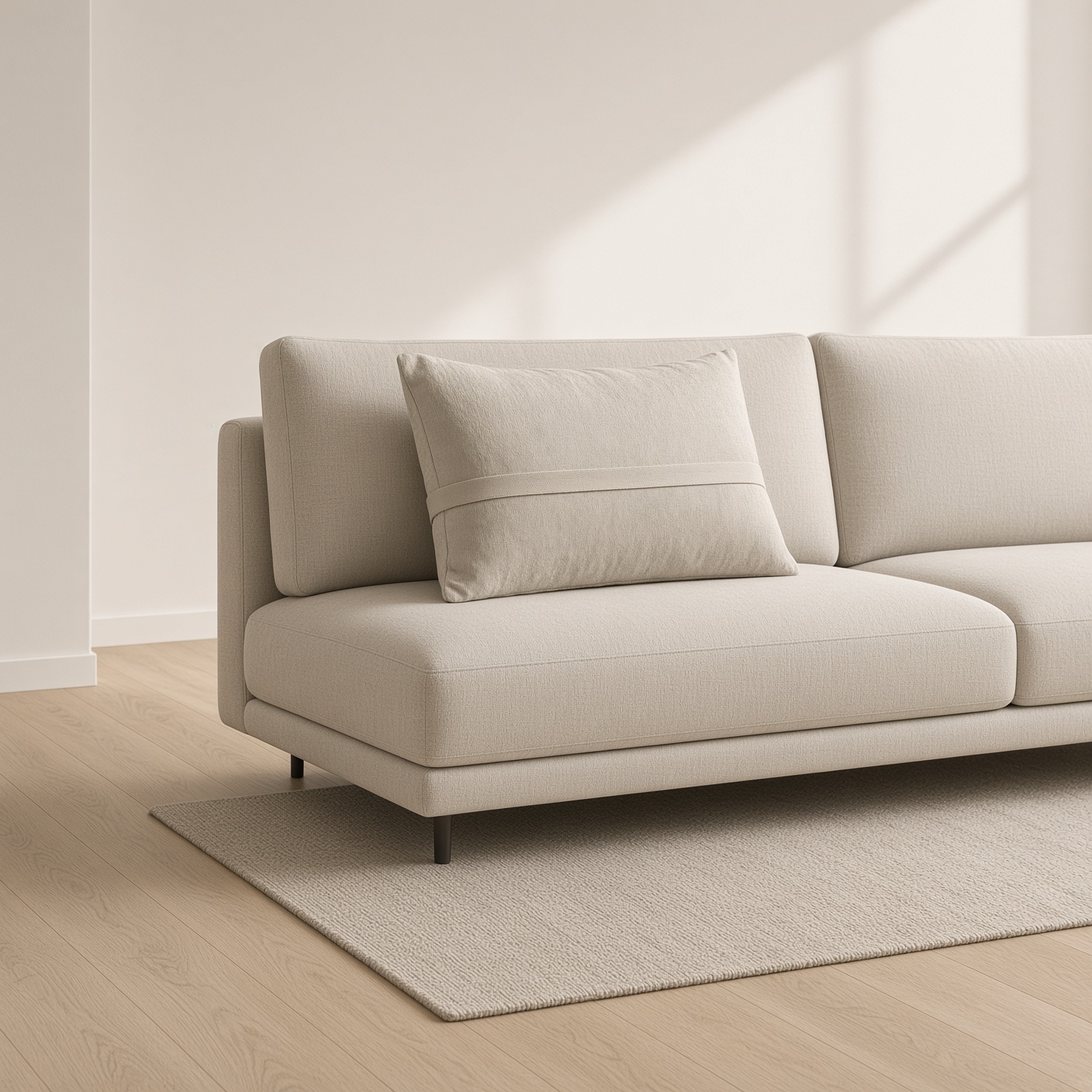 An oatmeal linen lumbar cushion with a cotton strap.